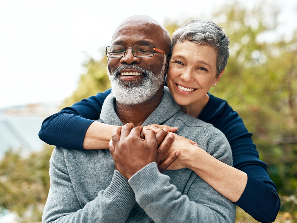 happy senior couple enjoying quality time at the park